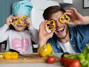 Teacher and child making plant salad