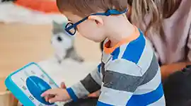 Boy playing with Time Timer