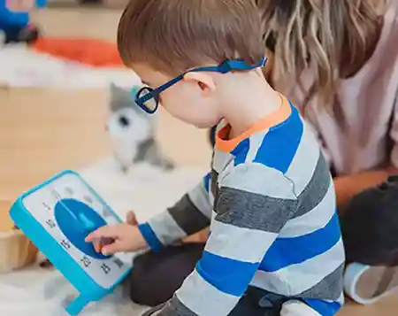 Boy playing with Time Timer