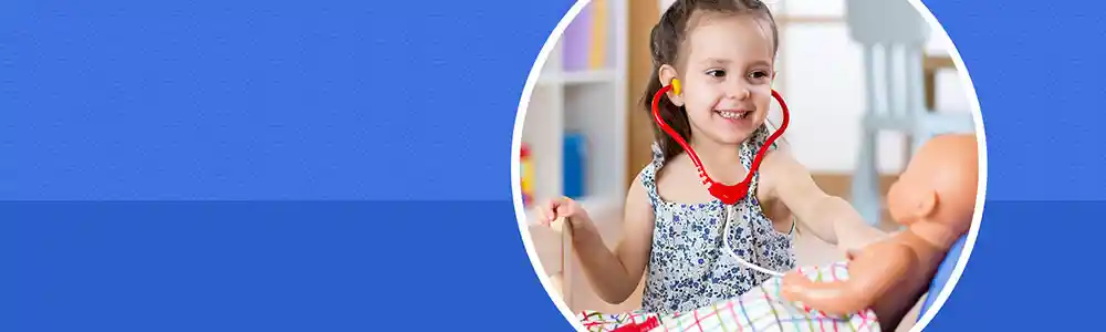 Preschool child playing with doll